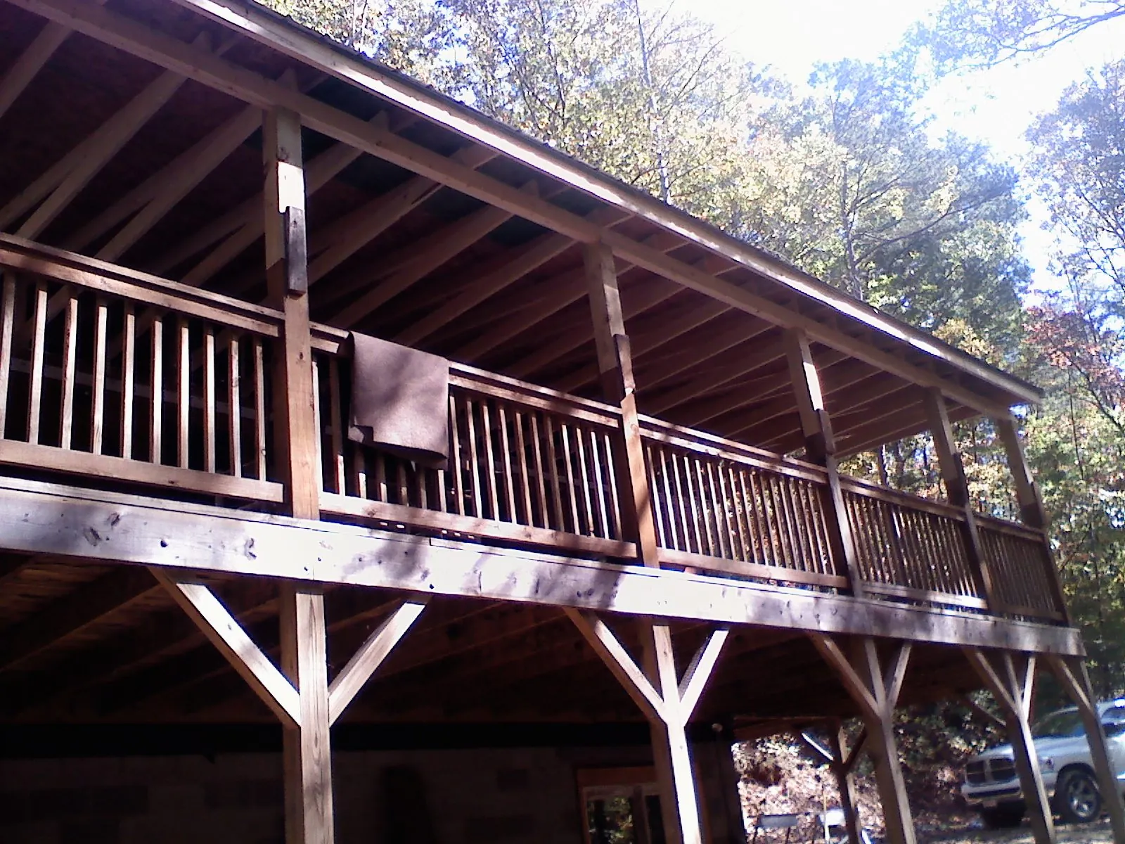 Timber framing under a new elevated porch and deck — Roof Leak Repair in Hanley Falls by Roofing Brothers